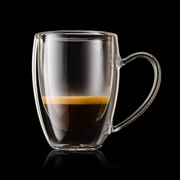 istock Transparent double wall glass mug with ristretto coffee on black background. 1805971036