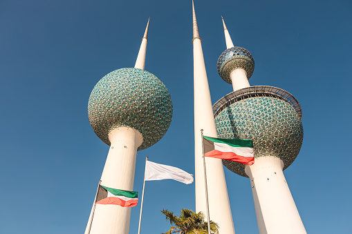 Towers and the flag of Kuwait.