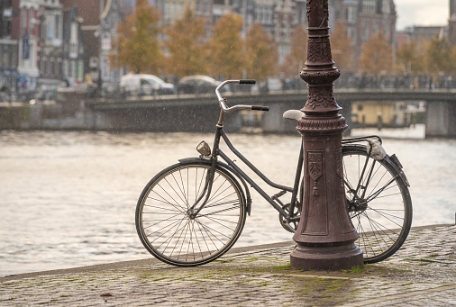 Bicycle by the canal, selective focus