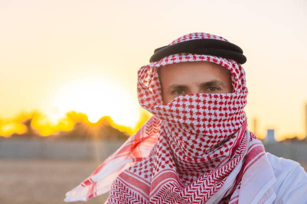 istock Portrait of a young sheik on the beach during sunset 1805986000