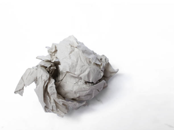 istock Crumpled paper ball, thrown out idea notes into trash garbage concept, isolated 1805989760