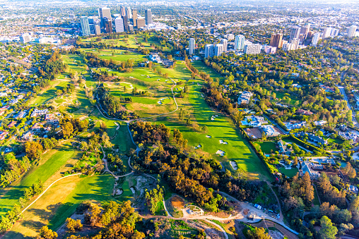 The Los Angeles Country Club with the skyline of Century City in the background located in Beverly Hills, California shot via helicopter from an altitude of about 1500 feet.