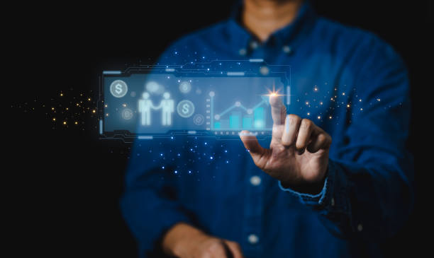 istock businessman analyzes company profits, growing, profitable sales with digital reality graphics, icons,negotiations, discussing good business deals. 1805990112