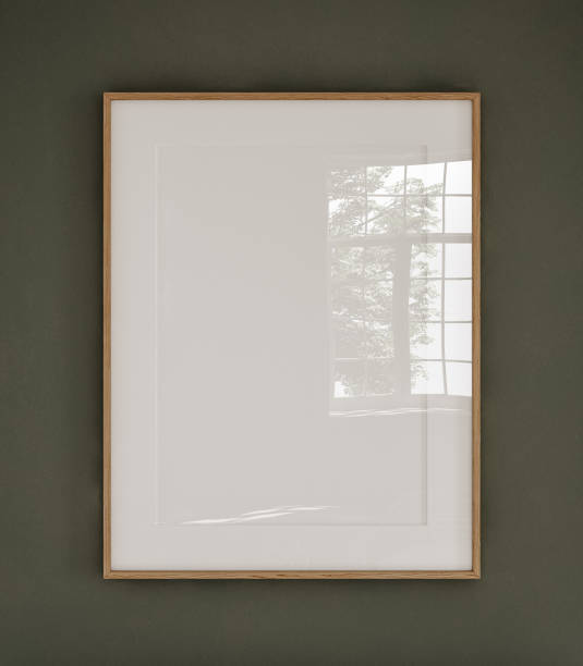 istock Mockup poster frame close up on wall painted green color 1805998833