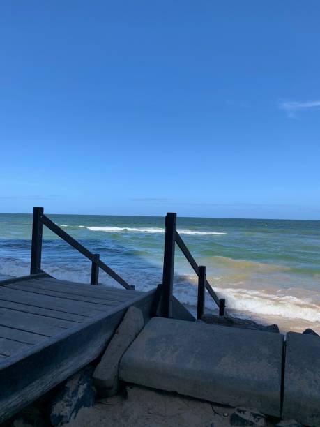 istock Beautiful beach with blue and sunny sky 1806017820