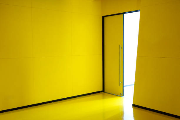 istock yellow room modern art open door background texture architecture 1806018382