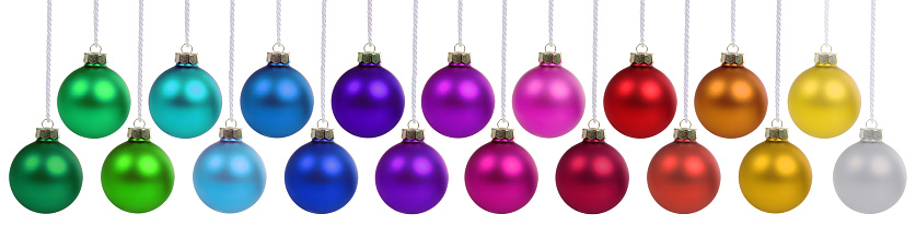 Christmas balls many baubles banner with colorful colors color decoration deco hanging isolated on white