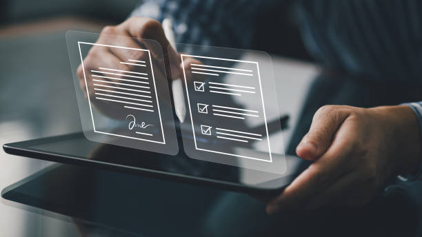 istock E-document management with e-signing. Electronic digital signature and paperless smart office technology for work flow concept. 1806028941