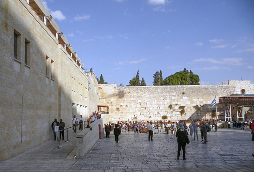 Western Wall and people praying in Jerusalem, Israel - November 15, 2023