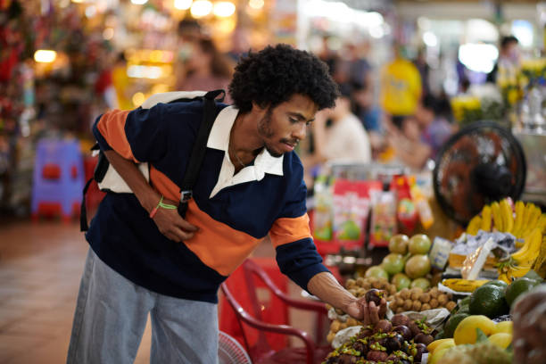 istock Man Shopping at Local Market 1806030679