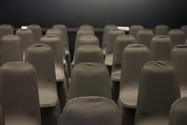 istock line up chairs color black in seminar room conference 1806045490