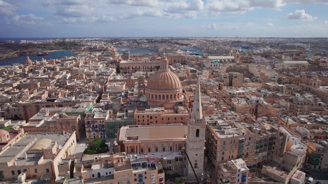 Smooth Aerial Orbit Around St Paul's Cathedral Dome in Valletta, Malta
