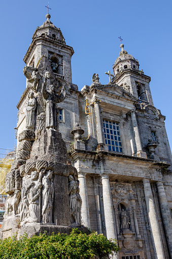 Experience the grandeur of a centuries-old Catholic church as its ornate Christian crosses pierce the endless blue sky. This is a magnificent example of ancient Roman architecture, welcoming travelers with open arms.