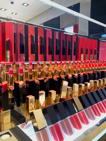Lipsticks on shelf at Duty-free shops at airports lipstick department wide range of brand less lip products mockup and illustration Ideal for graphic designers, architects and interior designers.