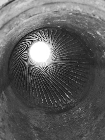 Rifling spiral grooves cut into the inside of a barrel of a cannon causing the ball or projectile to spin as it flies through the air.