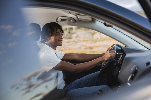 istock Happy Driver. African American man driving. 1806113815