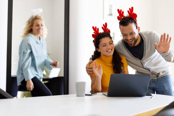 istock Young People Celebrating New Year in Modern Office 1806113856