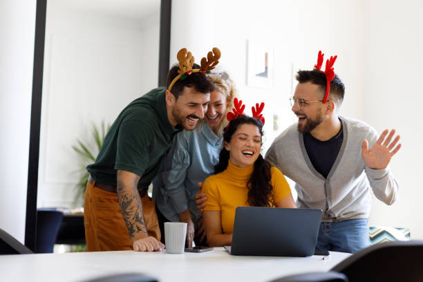Young People Celebrating New Year in Modern Office