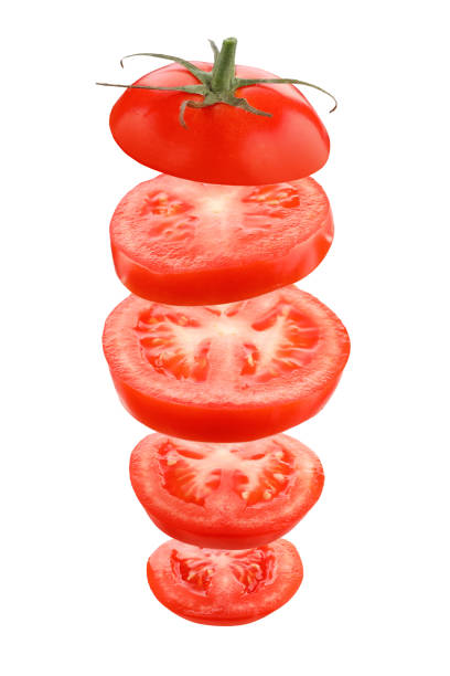 istock Cut red tomato isolated on white. Vertical order of slices 1806140890