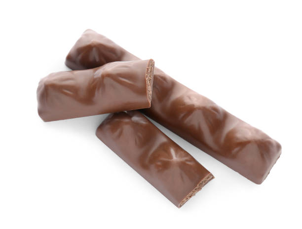 istock Pieces of tasty chocolate bars on white background, top view 1806151299