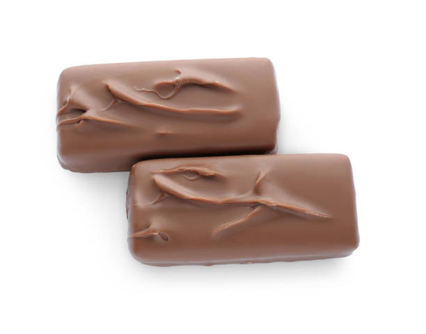 istock Tasty chocolate bars on white background, top view 1806153603