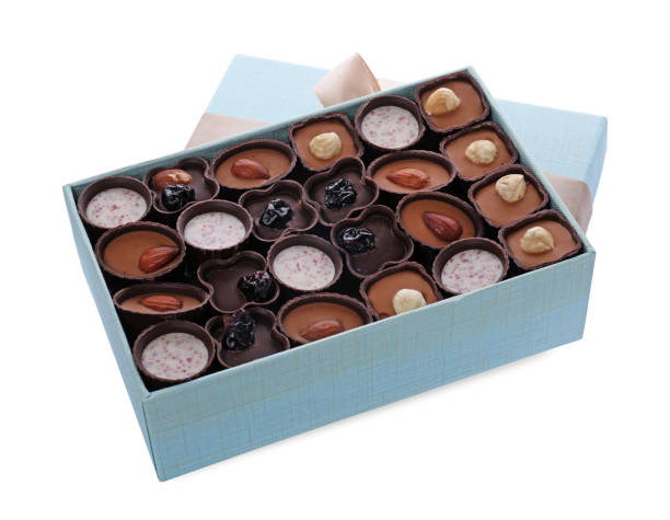 istock Box of delicious chocolate candies isolated on white 1806164062