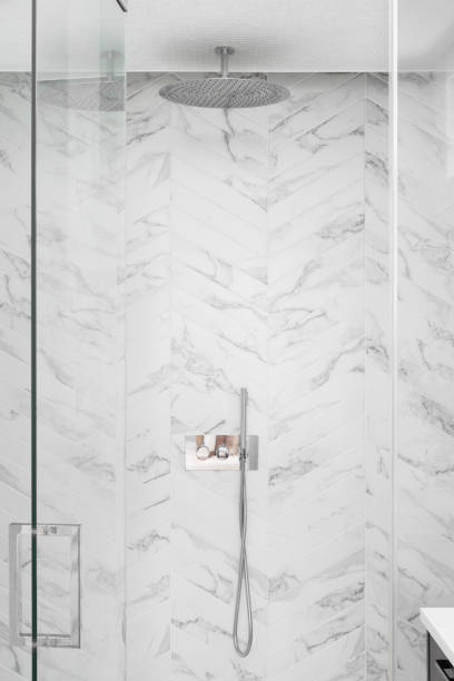 istock A shower detail with marble herringbone tiles. 1806164070
