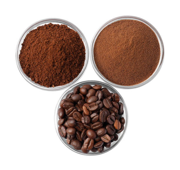 istock Bowls with different types of coffee on white background, top view 1806164622