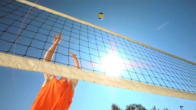 HD Super Slow-Mo: Volleyball Player Making A Jump Serve