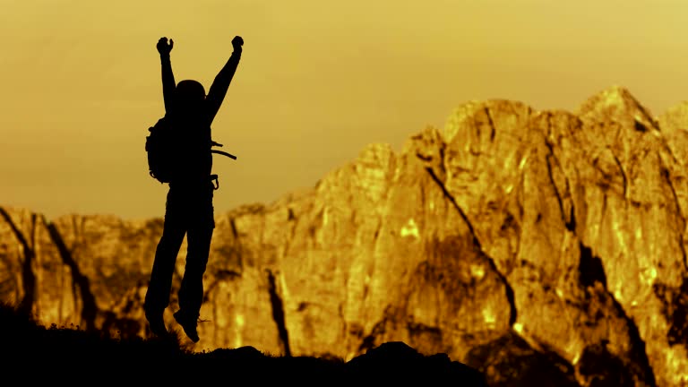 HD Super Slow-Mo: Climber Jumping In Victory