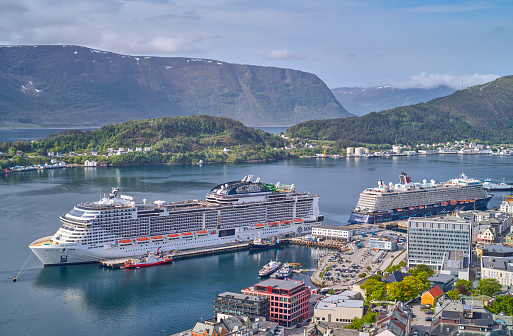 Alesund, Norway - June 8, 2022: View of the harbor with the cruise ships