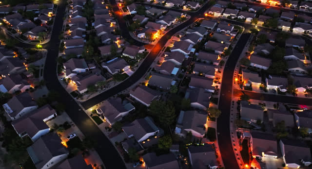High Angle Orbiting Drone Shot of Suburban Housing Development in St. George, UT at Night