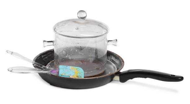 istock Many different dirty dishes on white background 1806221740