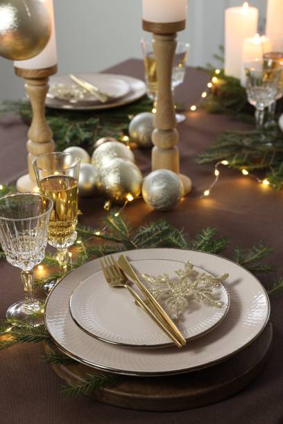 istock Table setting with festive lights and Christmas decor 1806233083
