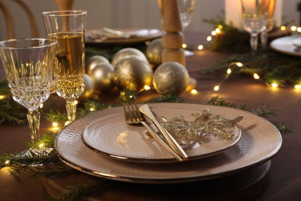 istock Table setting with festive lights and Christmas decor 1806233088