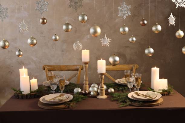 istock Christmas table setting with burning candles and festive decor 1806233606