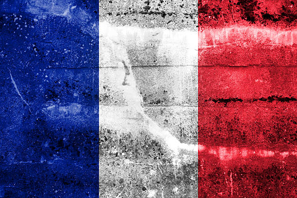 istock France Flag painted on grunge wall 180624972