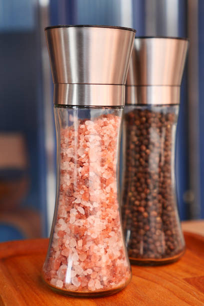 Raw dried pink Himalayan salt in container