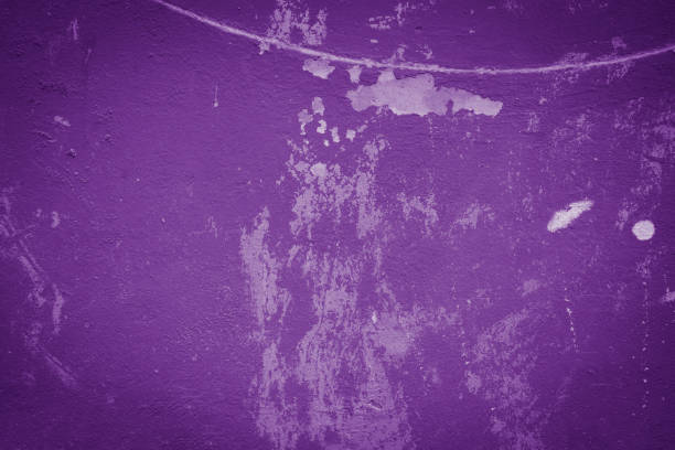 istock Purple concrete wall background abstract. 1806270528