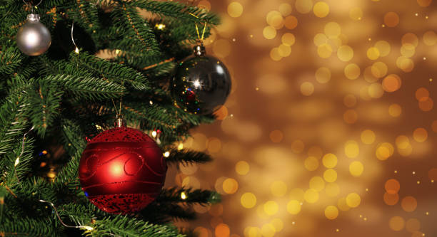 istock Beautiful Christmas tree decorated with shiny baubles against blurred lights, bokeh effect. Banner design with space for text 1806279698