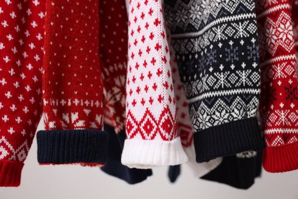 istock Closeup view of many different Christmas sweaters 1806283005