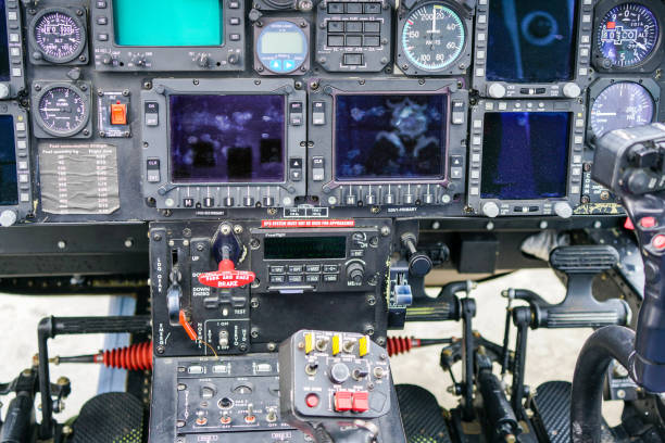 istock Interior view of helicopter Agusta cockpit with control pedals, dashboard, displays, selected focus 1806292664