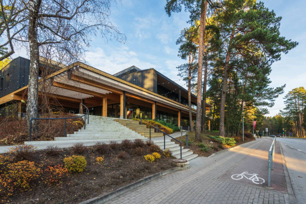 Ogre, Latvia - November 19, 2023: Modern wooden library building. Architects Valdis Onkelis, Rudis Rubenis. The building was built in 2021 and won the Latvian Architecture of the Year award