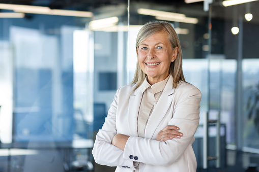 Close up portrait of a professional business woman smiling outdoor