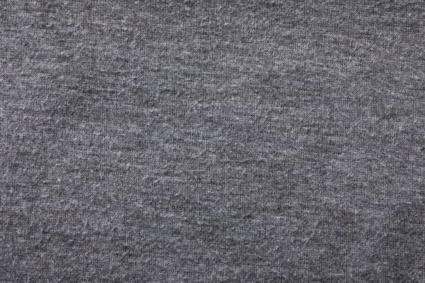 istock Grey cloth with lint as background, closeup. Before using of fabric shaver 1806316523