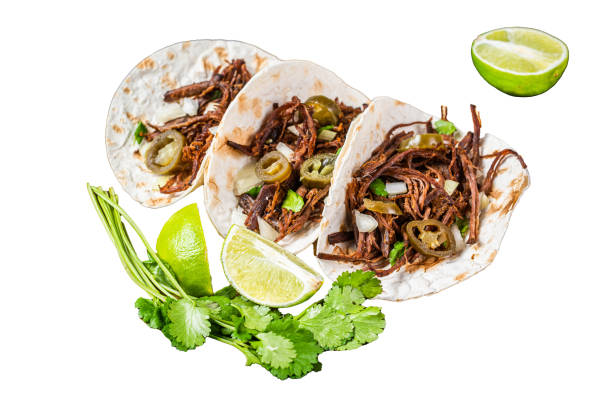 istock Mexican Beef Barbacoa Tacos with Cilantro and Onion.  Isolated, white background. 1806344439
