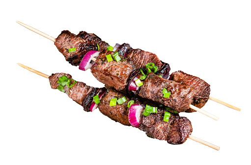 Shish kebab with beef and lamb meat, onion and herbs on Skewers. Isolated, white background