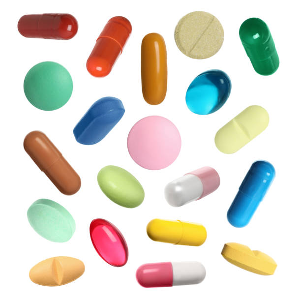 istock Many pills in different forms and colors isolated on white, collection 1806346777