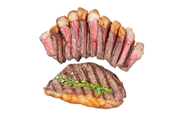 istock Sliced grilled medium rare Top sirloin beef steak on a plate Isolated, white background. 1806355930