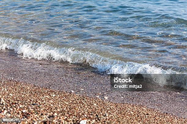 Wave On The Beach Stock Photo - Download Image Now - Beach, Blue, Breaking